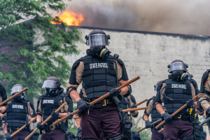 Minnesota State Patrol troopers stand in formation wearing riot gear 29 May 2020