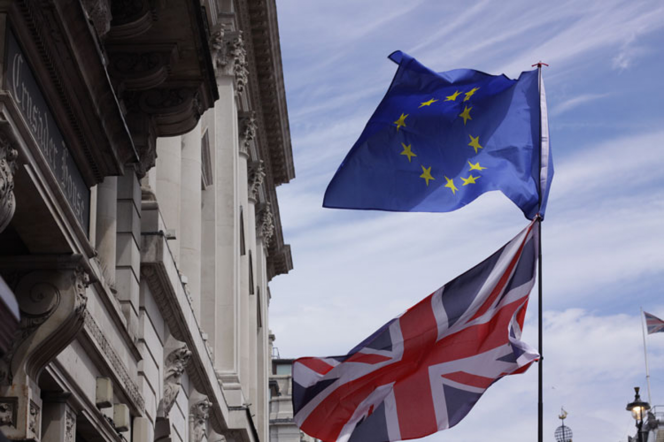 UK’s visa waiver program is likely to be extended to EU nationals following Brexit. UK & EU Flags